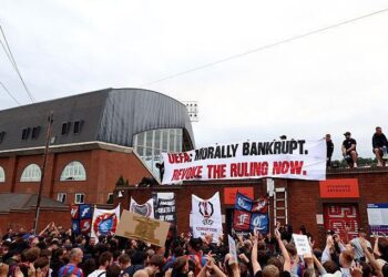 Crystal Palace fans protest UEFA decision to demote club to Conference League.